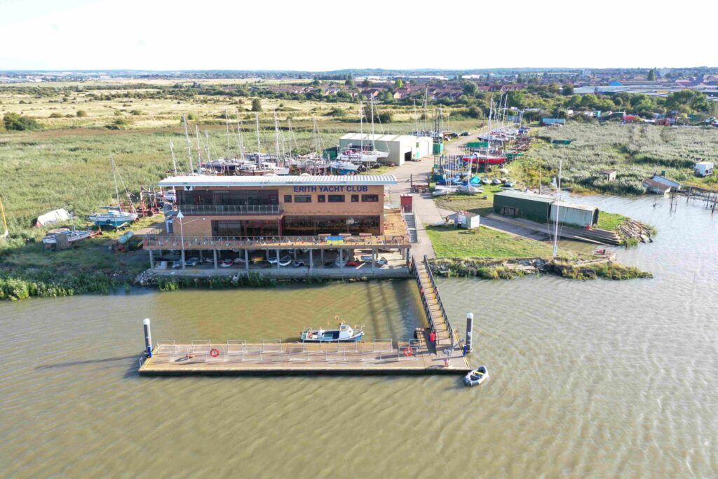 View of Erith Yacht Club from above the Thames. Showing the Clubhouse and Pontoon
